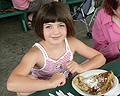 Child eating crepes Montreal